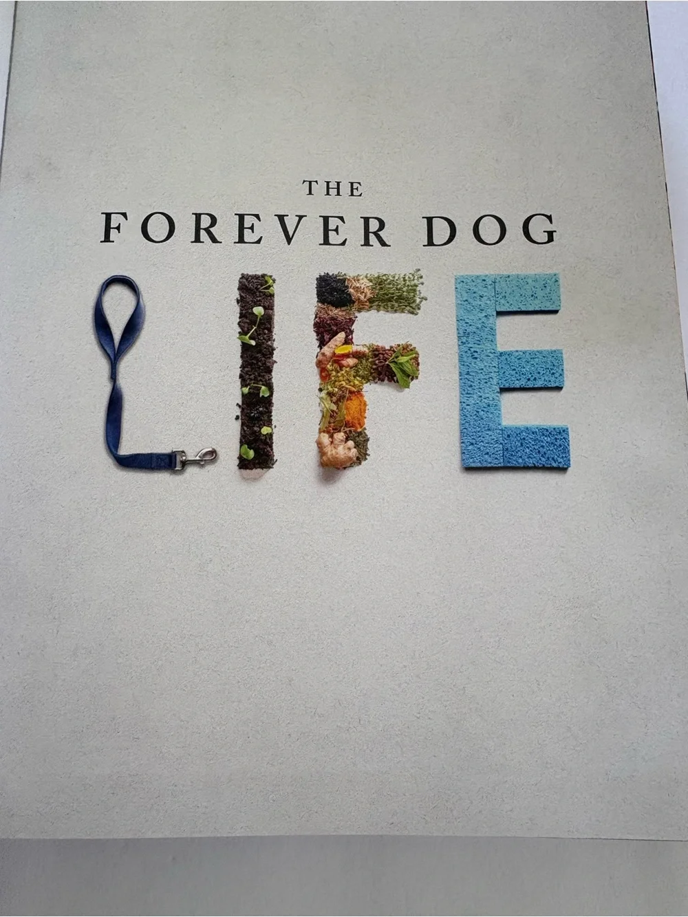The Forever Dog Life - Dog Care & Recipe Book (White/Cream Cover)